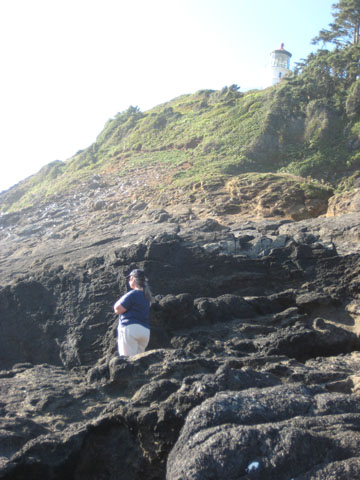Mom standing on the rocks looking out at the ocean. Devil's Elbow - Oregon Coast